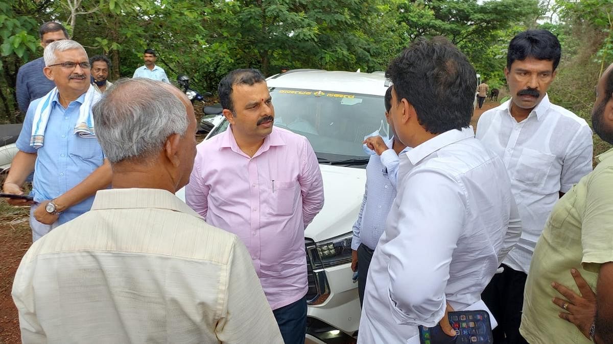 District In-Charge Minister V Sunil Kumar inspects the site proposed for the Rangamandira in Bondel on Tuesday evening.