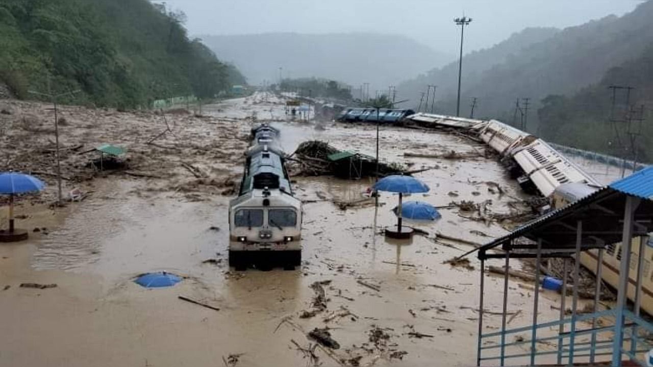An empty passenger train standing at New Haflong station was washed away from the tracks due to a massive landslide. Credit: Northeast Frontier Railway