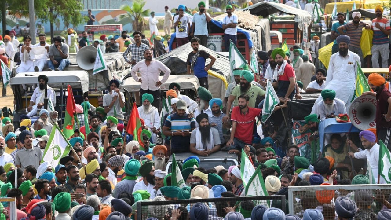 Farmers of the Sanyukt Kisan Morcha protest near Chandigarh-Mohali border after being stopped from heading towards Chandigarh, in Mohali, Tuesday, May 17, 2022. Credit: PTI Photo