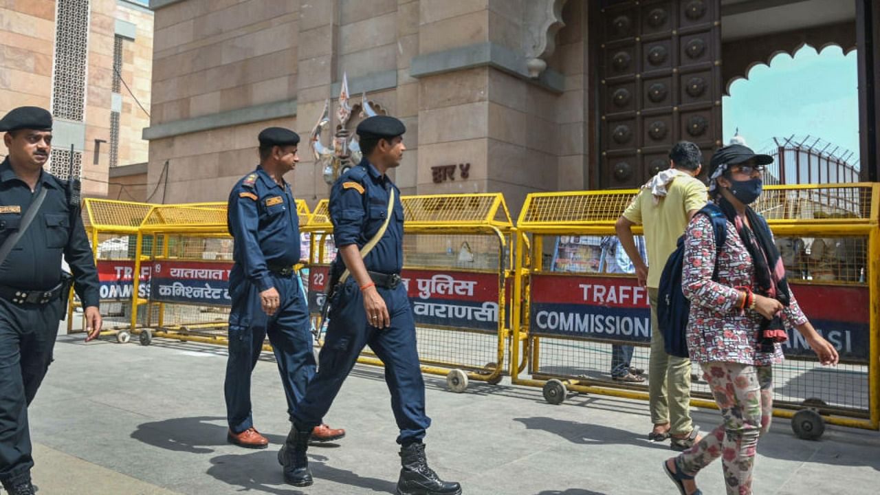 Security personnel guard outside the Gyanvapi mosque after its survey by a commission, in VaranasiTuesday, May 17, 2022. Credit: PTI Photo