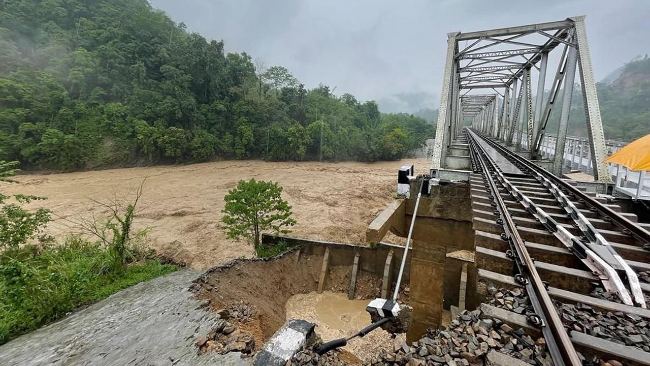 This photo taken between May 12 and May 14 shows a view of a damaged railway bridge due to heavy rainfall in the Dima Hasao district. Credit: PTI Photo