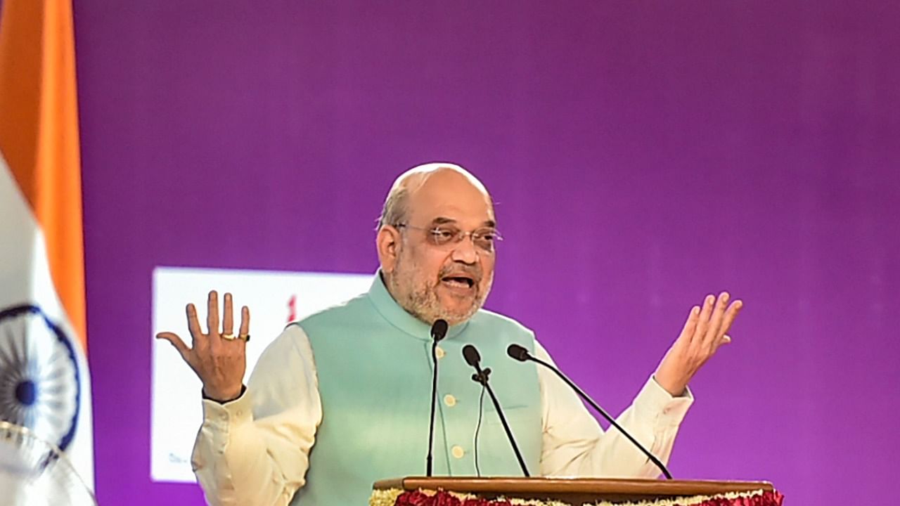 Union Home Minister Amit Shah speaks at the three-day international seminar titled ‘Revisiting the Ideas of India from Swaraj to New India’, organised by the Delhi University's Political Science department. Credit: PTI Photo