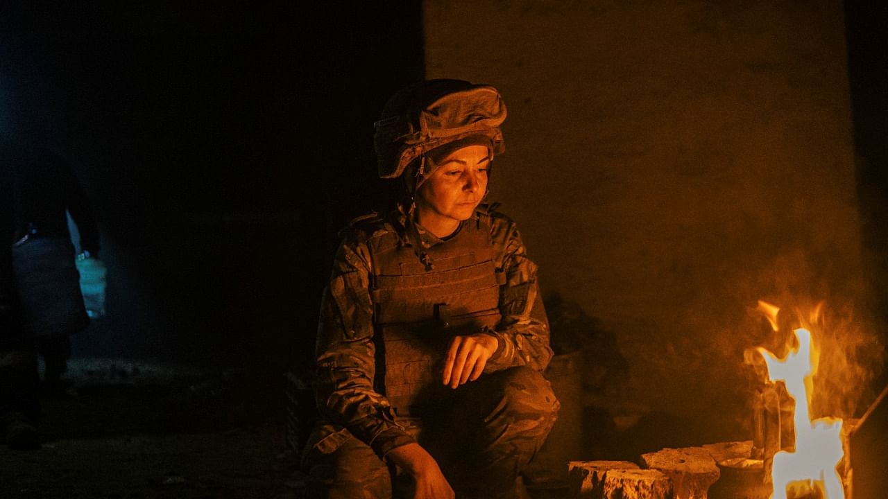 Ukrainian Azovstal service members are seen within the Azovstal Iron and Steel Works complex in Mariupol. Credit: Reuters file Photo