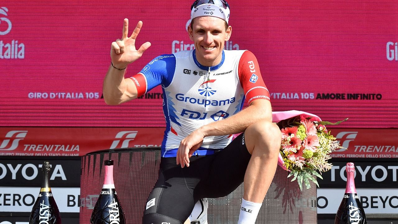  FDJ's Arnaud Demare celebrates after winning stage 13 on the podium. Credit: Reuters Photo