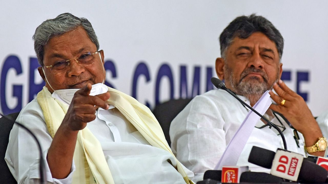 KPCC president DK Shivakumar and Leader of the Opposition in the assembly Siddaramaiah. Credit: DH Photo