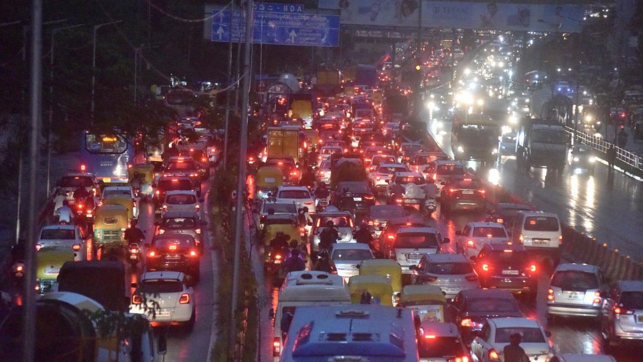 Heavy traffic jam on Airport road near Hebbal due to heavy rain in Bengaluru on Monday.