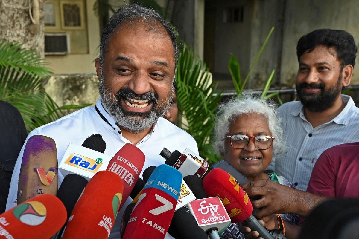 A G Perarivalan (L), who was jailed over the assassination of former prime minister Rajiv Gandhi, speaks with the members of media outside his residence in Chennai on May 18, 2022. Credit: PTI File Photo