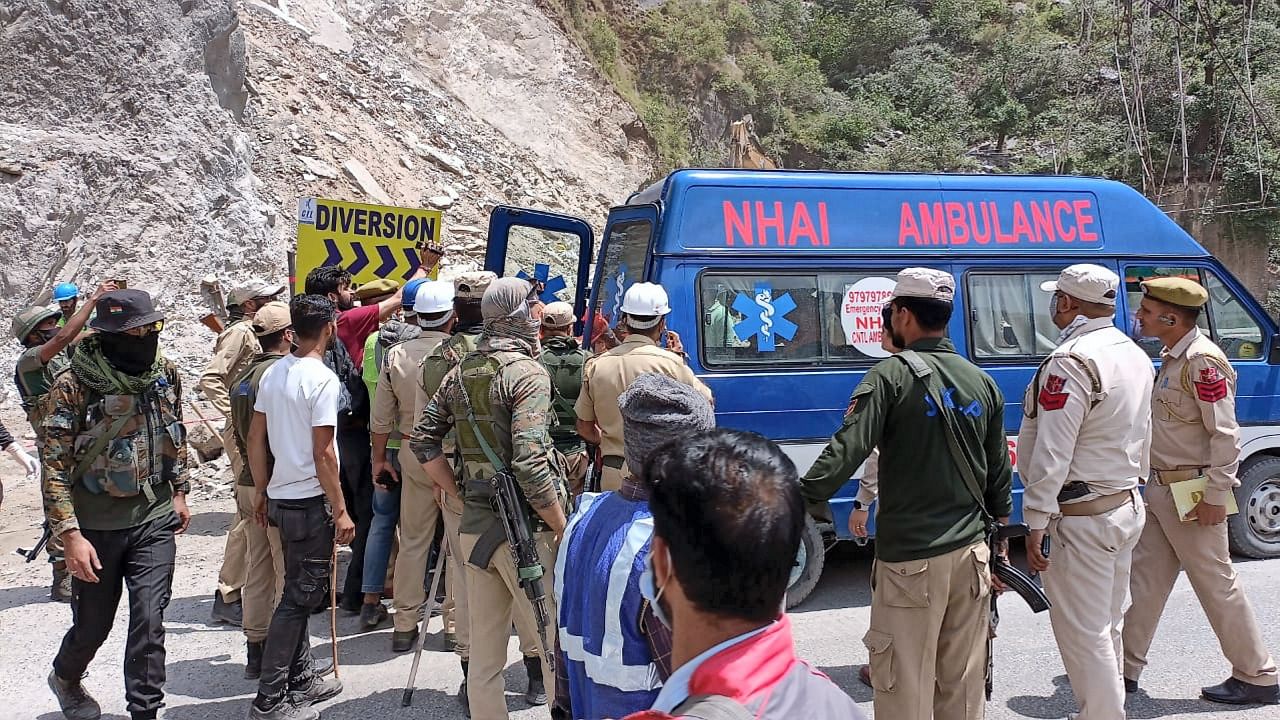 Rescue operation underway on the second consecutive day to save labourers trapped under debris following the collapse of an under-construction tunnel on the Jammu-Srinagar national highway, near Magarkote in Ramban district. Credit: PTI Photo