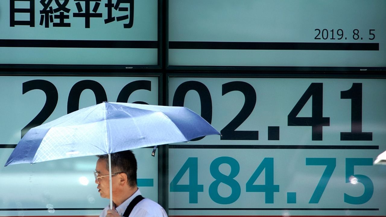 A negative tone was evident as Hong Kong's Hang Seng Index slid 0.38 per cent and the mainland's CSI300 Index dropped 0.37 per cent. Credit: AP Photo
