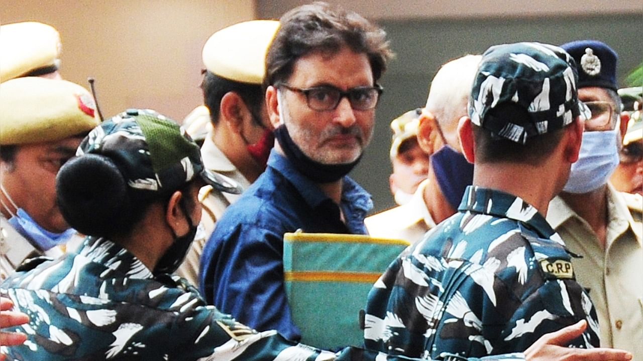  Kashmiri separatist leader Yasin Malik being produced at the Patiala House court in a terror funding case, in New Delhi. Credit: IANS 