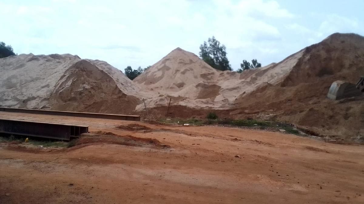 The sand stocked at Shambur stockyard. 