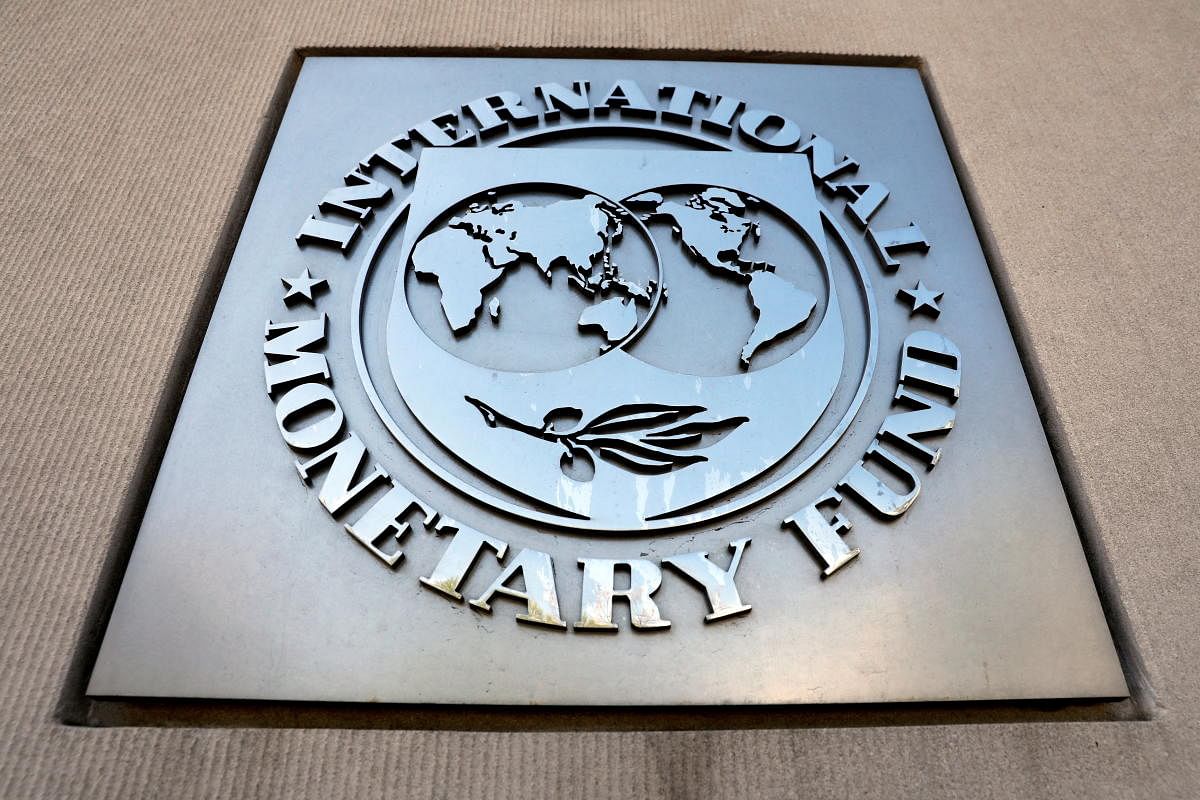 FILE PHOTO: International Monetary Fund logo is seen outside the headquarters building during the IMF/World Bank spring meeting in Washington, U.S., April 20, 2018. REUTERS/Yuri Gripas//File Photo