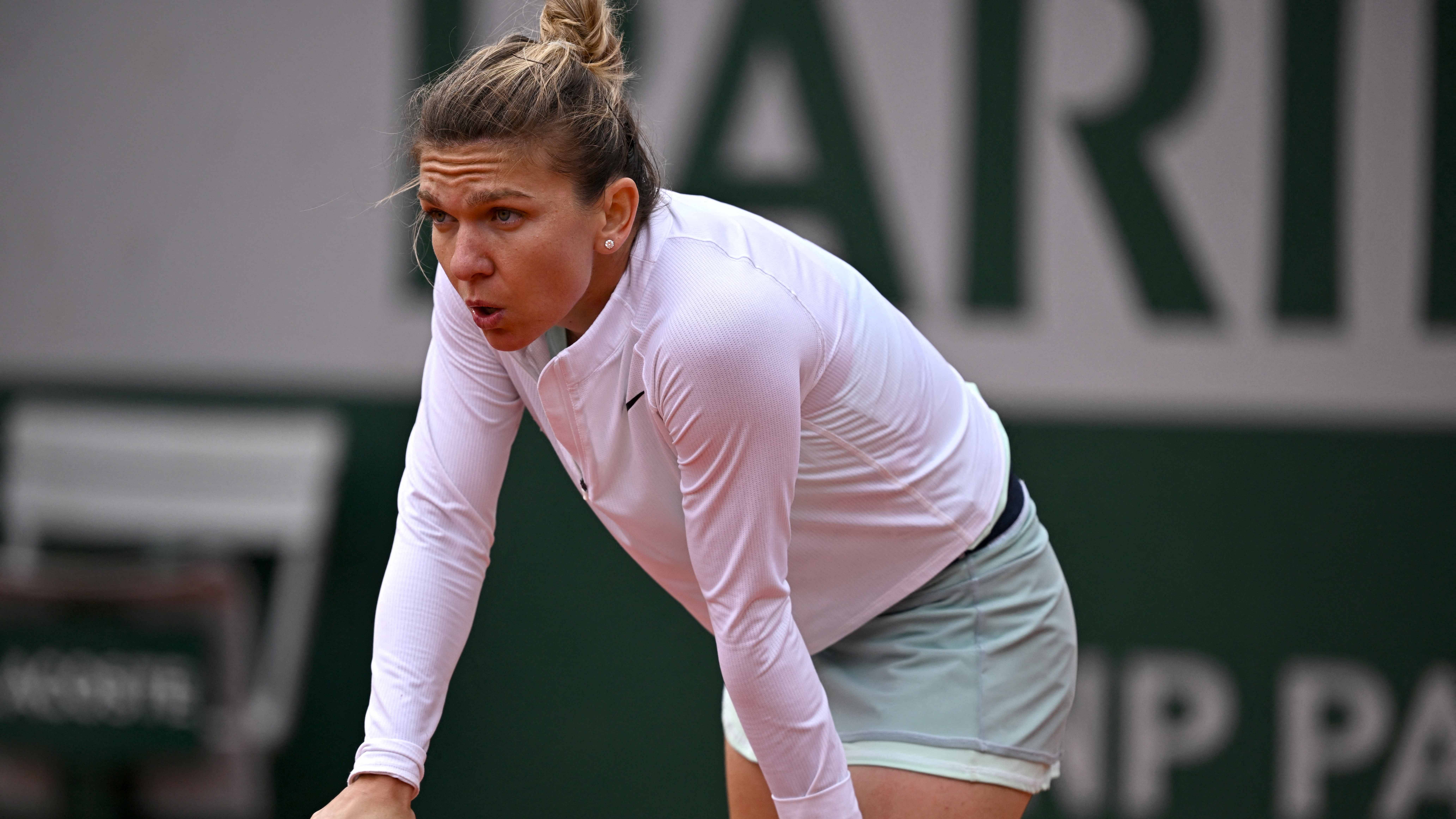 Former world number one Simona Halep crashed out of the French Open on Thursday as she failed to deal with the aggressive game of Chinese teenager Zheng Qinwen. Credit: Reuters File Photo