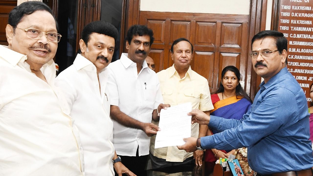 DMK's R Girirajan filing his nomination papers to contest the Rajya Sabha elections in Chennai on Friday. Chief Minister M K Stalin, DMP MP Kanimozhi and others are seen. Credit: DH Special Arrangement