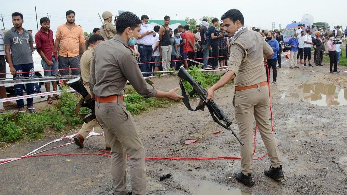 Kanpur: Police inspect the encounter site where gangster Vikas Dubey was killed when he allegedly tried to escape from the spot following an accident, near Kanpur, Friday morning, July 10, 2020. Dubey, accused of killing eight policemen, was being brought. Credit: PTI Photo