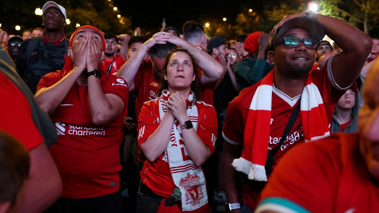 Fans watching the final on television at the Arkles pub next to Liverpool's home ground were confident the team would bounce back under manager Jurgen Klopp. Credit: Reuters Photo