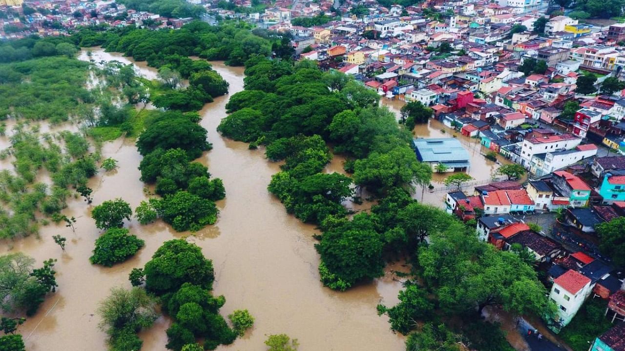 Aerial view of floods caused by heavy rains in Itapetinga, Bahia State, Brazil. Credit: AFP Photo