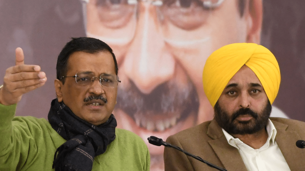 Punjab Chief Minister Bhagwant Mann and Delhi CM Arvind Kejriwal. Credit: AFP Photo