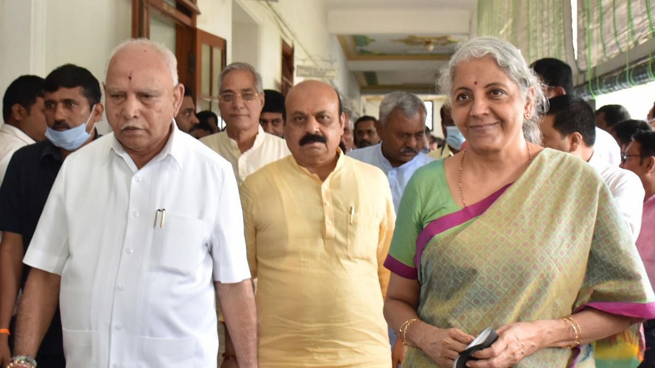 The BJP candidate for Rajya Sabha election and Union Minister Nirmala Sitharaman with Chief Minister Basavaraj Bommai and former chief minister B S Yediyurappa, after filing nomination for the polls, in Bengaluru on Tuesday. Credit: DH Photo/B K Janardhan