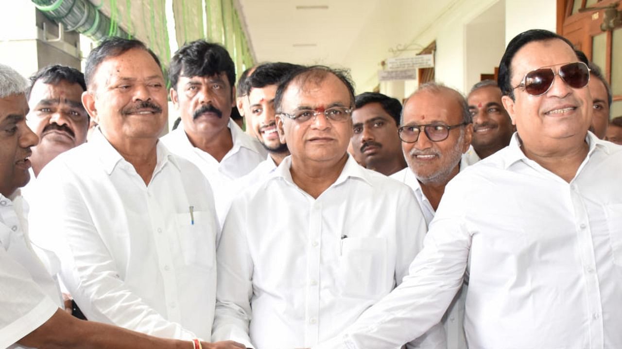 Kupendra Reddy (centre). Credit: DH Photo