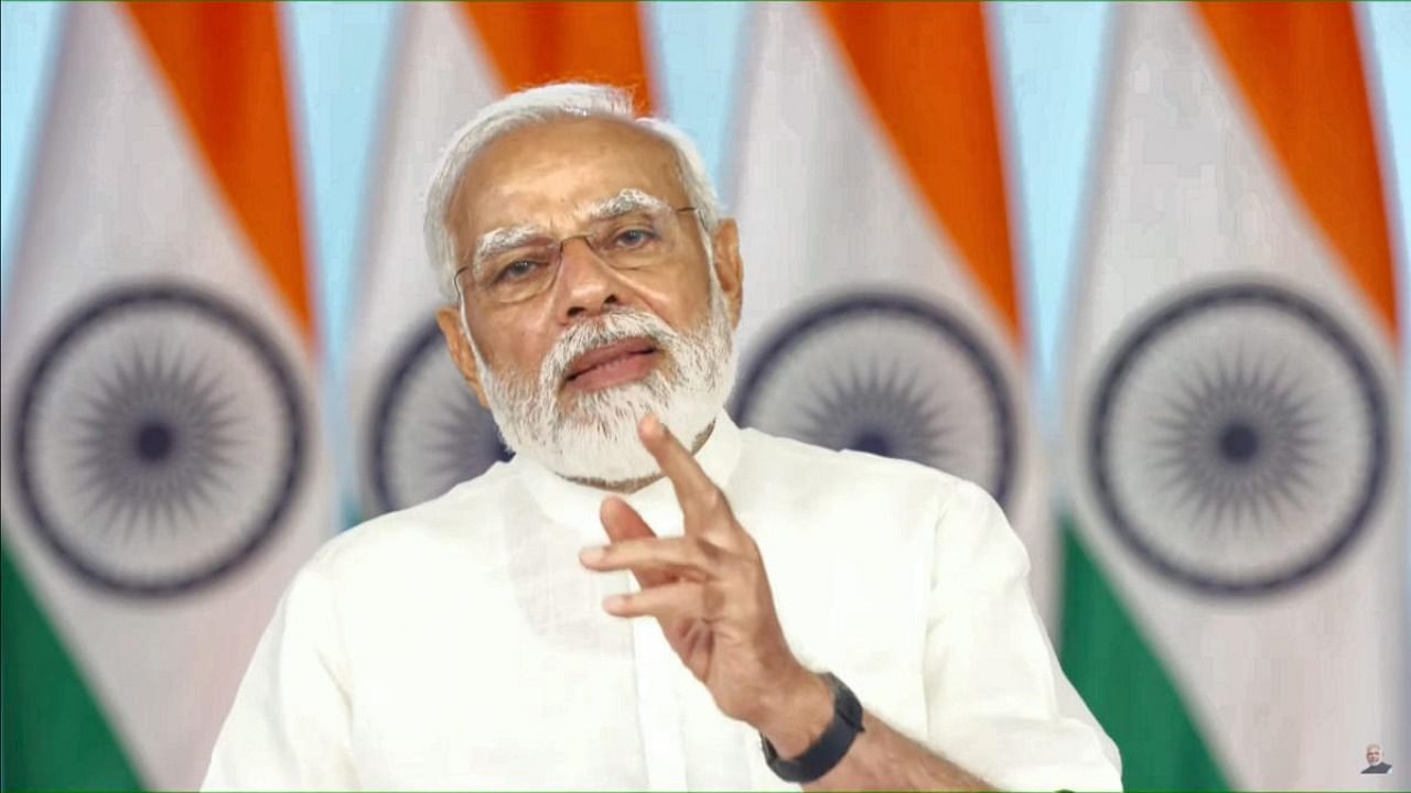 Prime Minister Narendra Modi speaks during a video conference as he releases benefits under the PM CARES for Children Scheme. Credit: PTI Photo