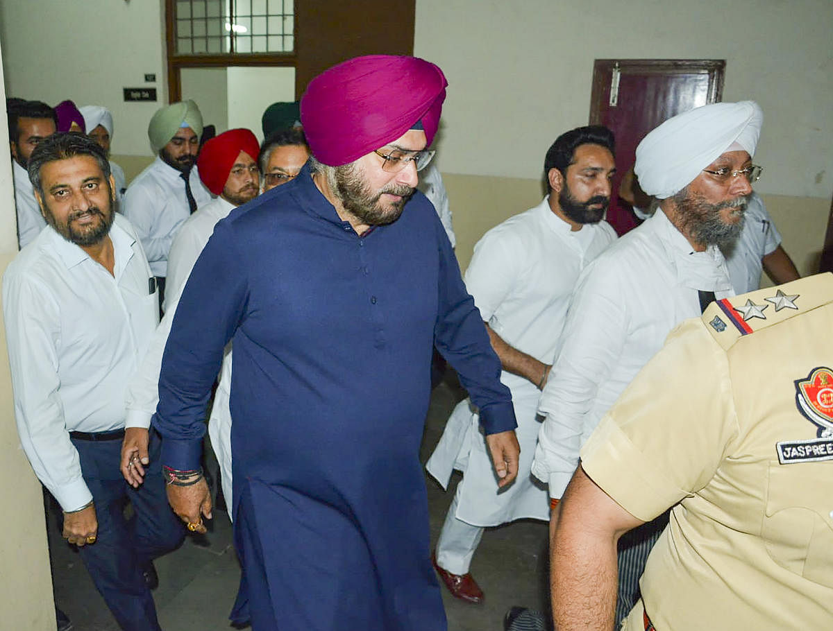 Patiala: Congress leader Navjot Singh Sidhu surrenders in the CJM court, in Patiala, Friday, May 20, 2022, a day after he was awarded one year in prison by the Supreme Court in a 1988-road rage case. Credit: PTI Photo