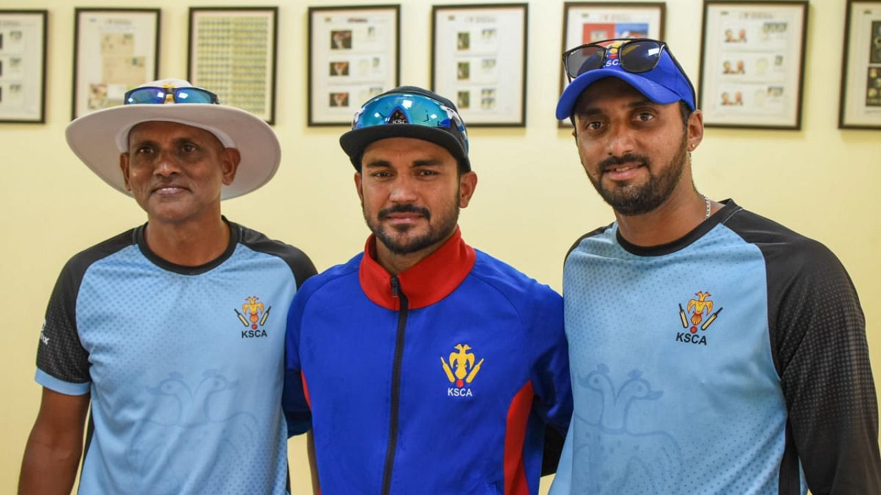 Karnataka captain Manish Pandey (centre) will have to bank on his years of experience to lead from the fore while head coach Yere Goud (left) and bowling coach S Aravind will be vital in coming up with a strategy going into the Ranji Trophy knockout round. Credit: DH Photo/Pushkar V