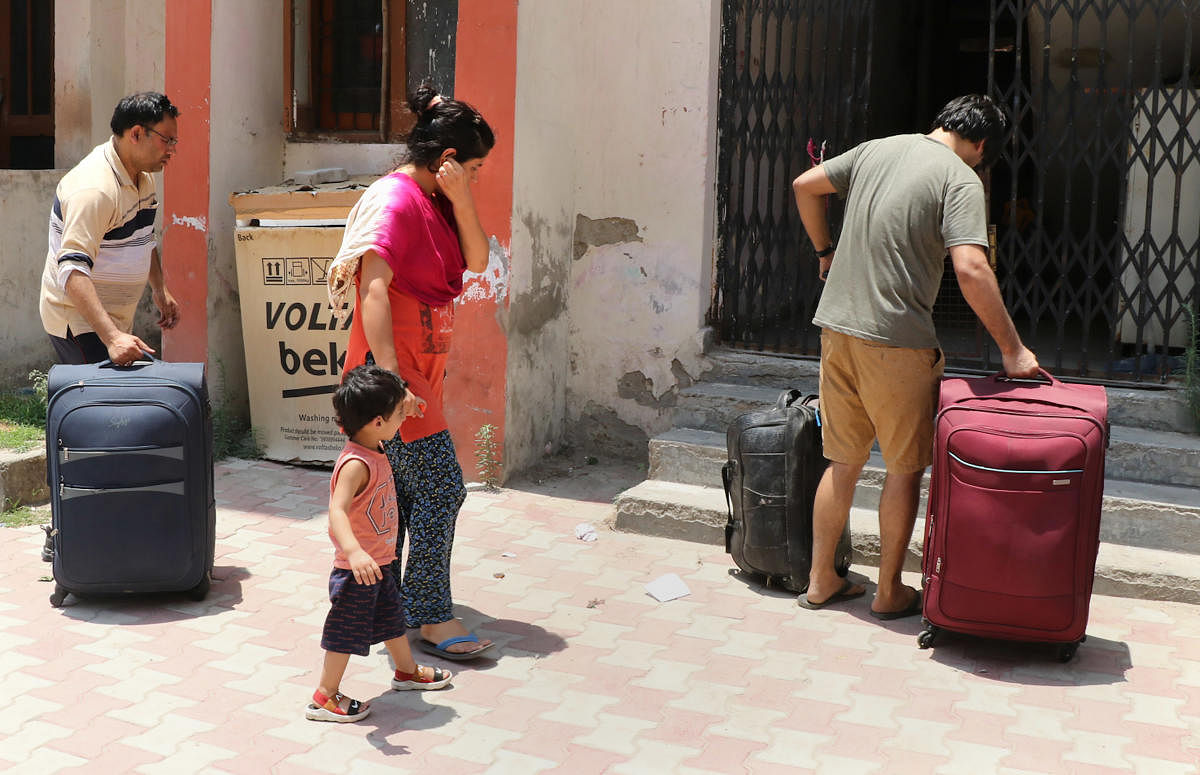 Jammu: A Kashmiri Pandit family returns to Jagti Migrants Camp in the wake of recent killings of employees in Kashmir by terrorists, in Jammu, Friday, June 3, 2022. Credit: PTI Photo