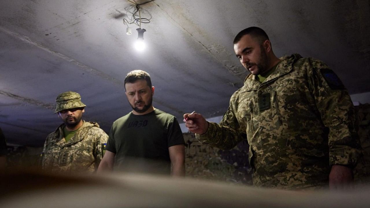 Volodymyr Zelenskyy talked to the servicemen and presented them with state awards and valuable gifts. Credit: AFP Photo