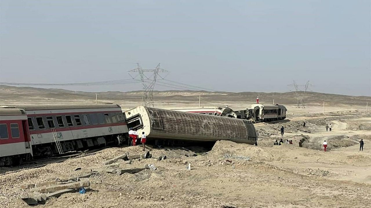 Rescuers at the scene of a train derailment near the central Iranian city of Tabas on the line between the Iranian cities of Mashhad and Yazd. Credit: AFP Photo