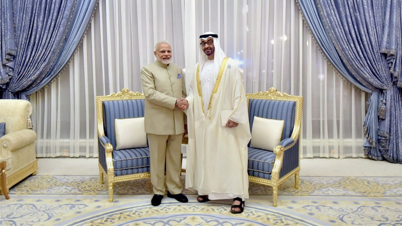 Prime Minister Narendra Modi and the Crown Prince of Abu Dhabi, Deputy Supreme Commander of U.A.E. Armed Forces, General Sheikh Mohammed Bin Zayed Al Nahyan at Presidential Palace in Abu Dhabi. Credit: PTI Photo