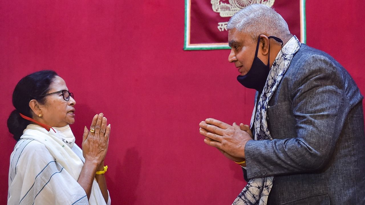 TMC Supremo Mamata Banerjee greets West Bengal Governor Jagdeep Dhankar. Credit: PTI Photo