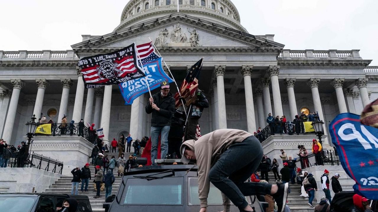 In this file photo taken on January 06, 2021 supporters of US President Donald Trump protest outside the US Capitol in Washington, DC. Credit: AFP Photo