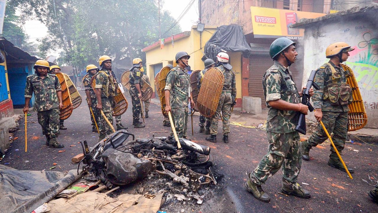 Security personnel deployed after violence during protest over controversial remarks made by two now-suspended BJP leaders about Prophet Mohammed, in Howrah. Credit: PTI Photo