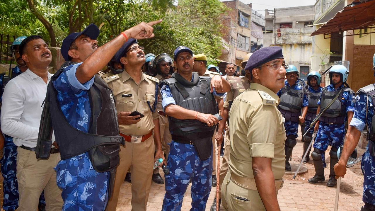 Security personnel conduct a flag march, a day after clashes during protest against now-suspended BJP leaders remark on Prophet Mohammed, in Prayagraj. Credit: PTI Photo