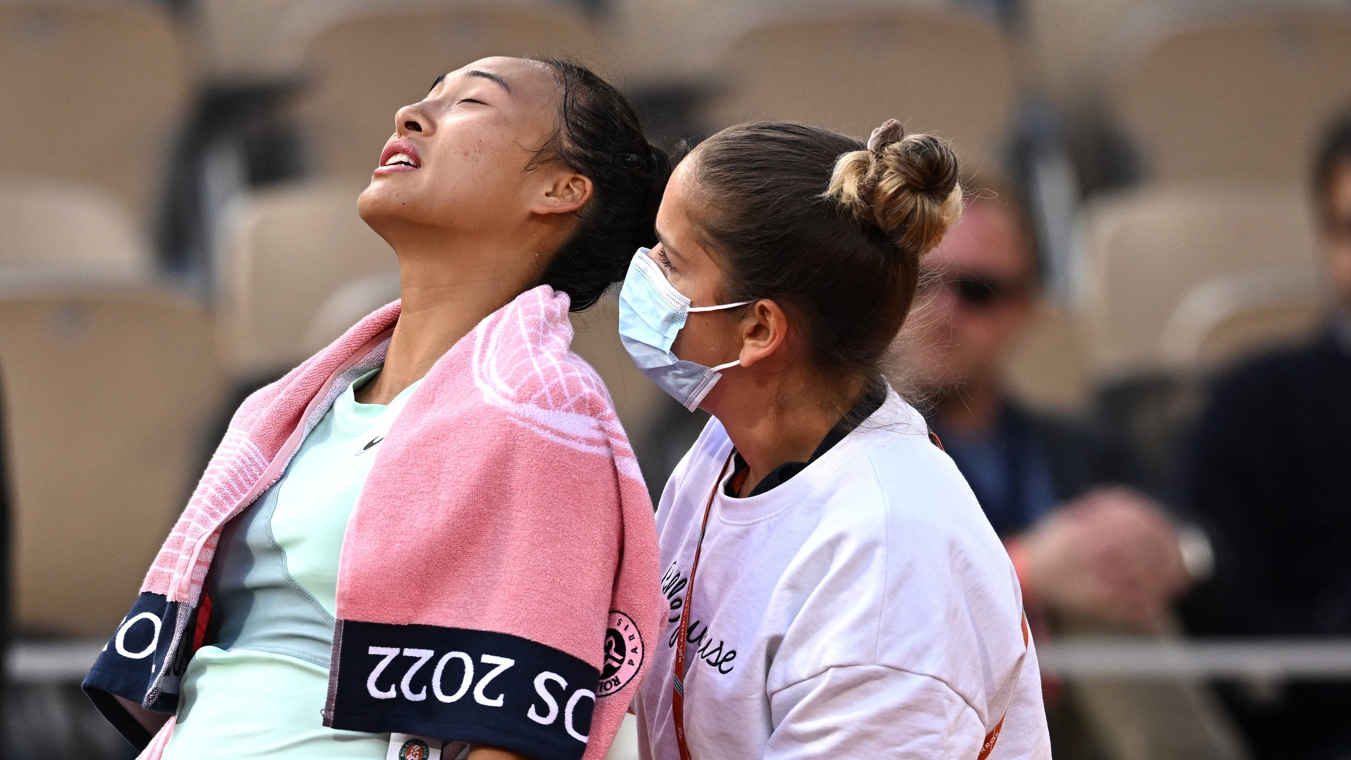 China’s Qinwen Zheng had to receive medical attention for menstrual cramps which were unbearable, she later said. Credit: Reuters Photo