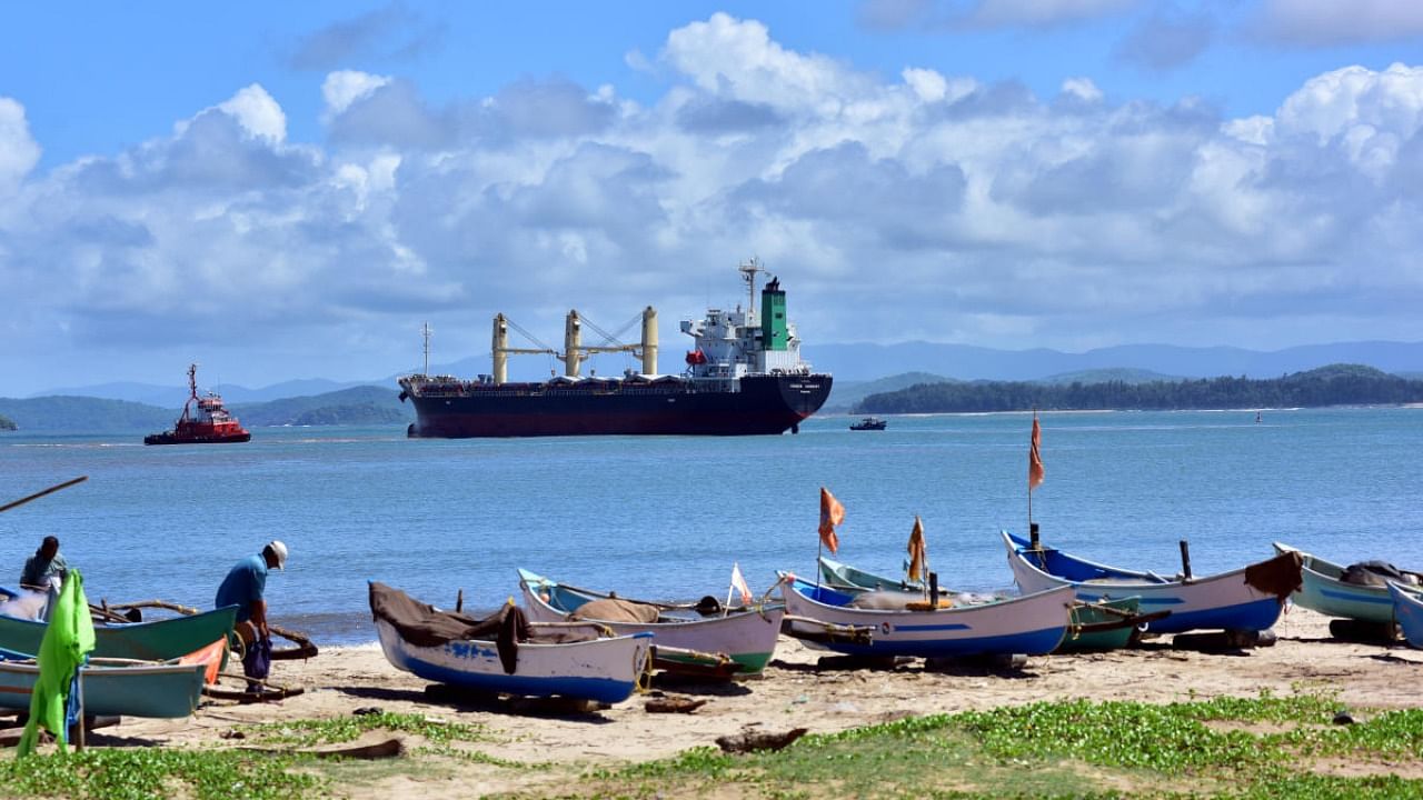 A cargo ship heads towards the Karwar port at Baithkol. The fishing community fears that the 12 port development projects proposed under the Sagarmala programme might disrupt coastal ecosystems. Credit: DH Photo