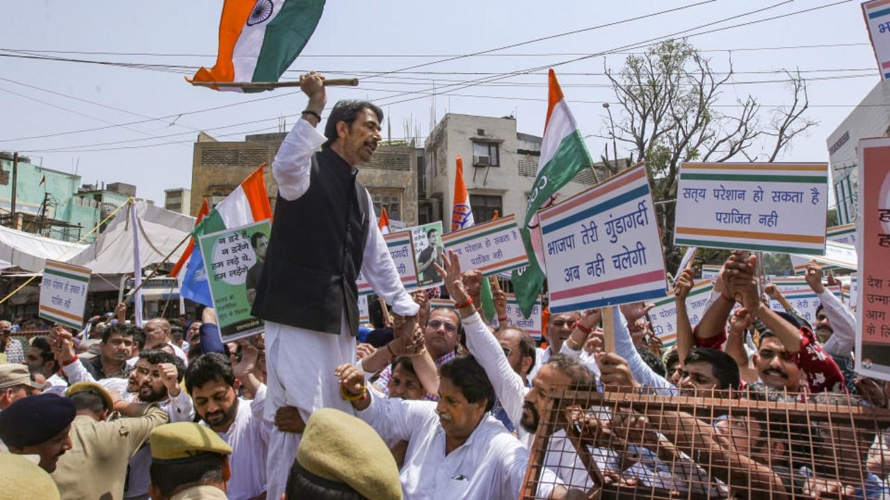 Congress workers stage a protest over summoning of party leader Rahul Gandhi in the National Herald case by ED, in Jammu, Monday, June 13, 2022. Credit: PTI Photo