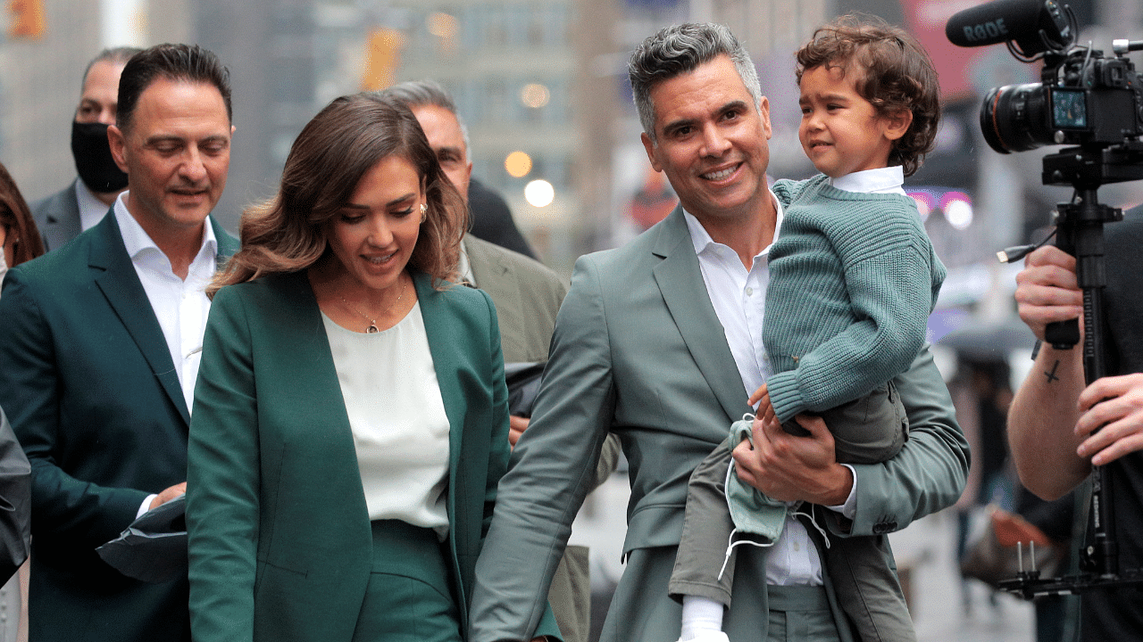 Actor and businesswoman Jessica Alba walks with her husband, film producer Cash Warren. Credit: Reuters Photo