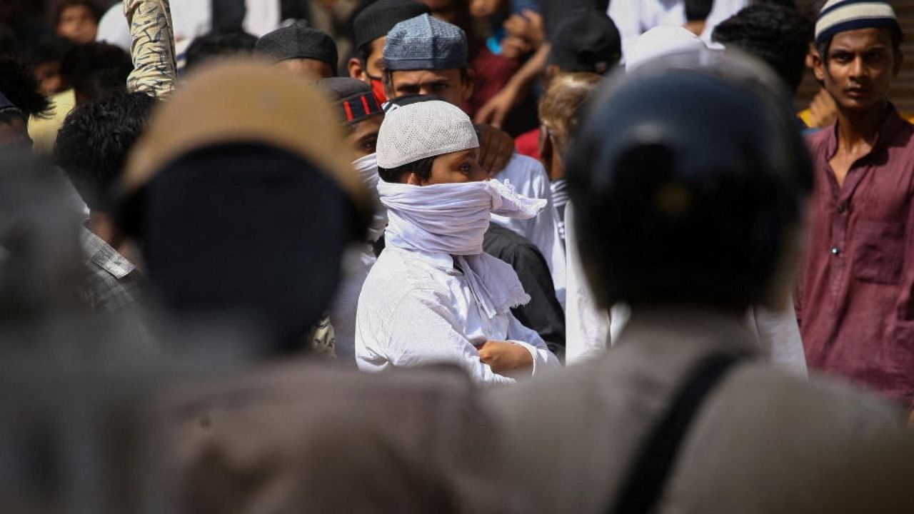 Protestors clash with police during a protest demanding the arrest of Bharatiya Janata Party (BJP) member Nupur Sharma for her comments on Prophet Mohammed, in Prayagraj, India, June 10, 2022. Credit: Reuters Photo
