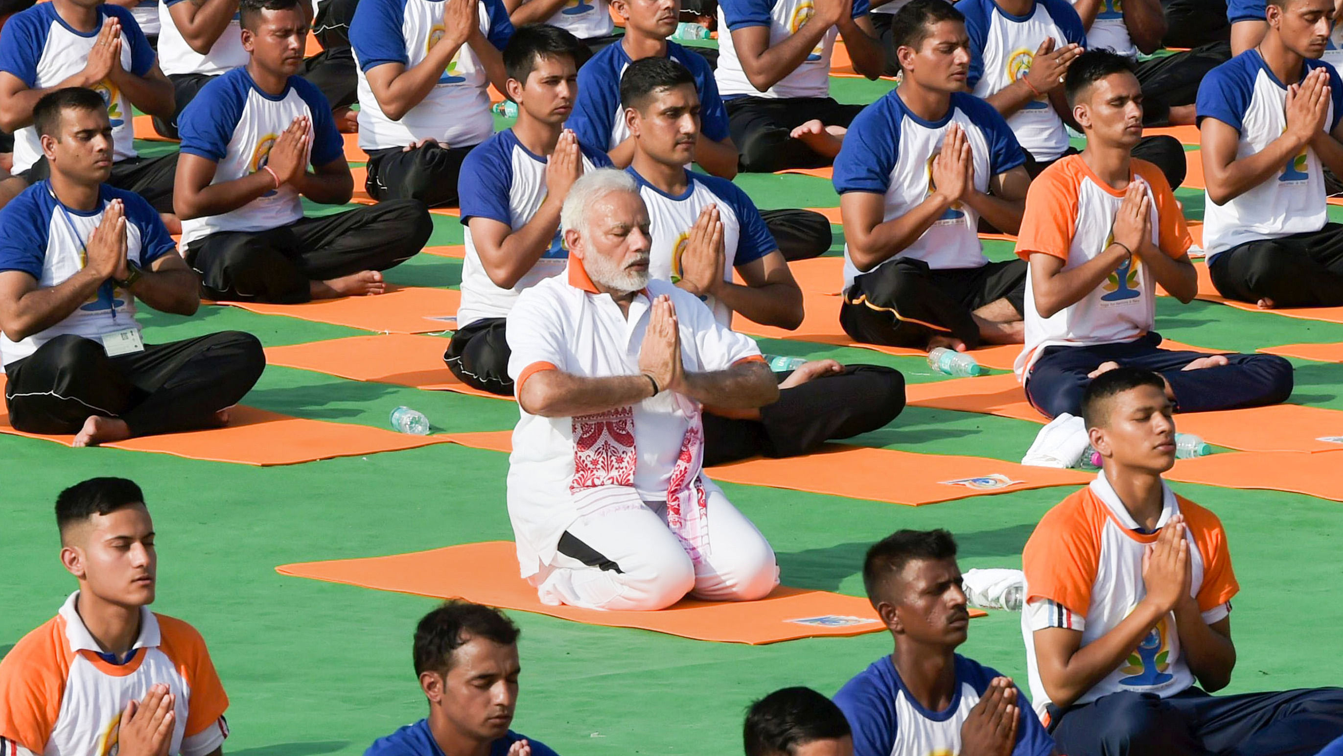  Prime Minister Narendra Modi performs yoga on International Yoga Day in Dehradun. Credit: PTI File Photo