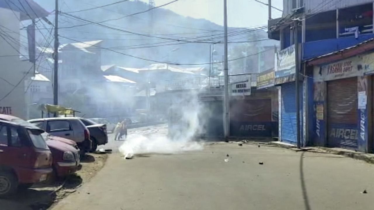 Smoke rises from a tear gas shell during curfew, amid communal tension over the controversial remarks by two now-suspended BJP leaders against Prophet Mohammad, at Bhaderwah in Doda district, Friday, June 10, 2022. Credit: PTI Photo