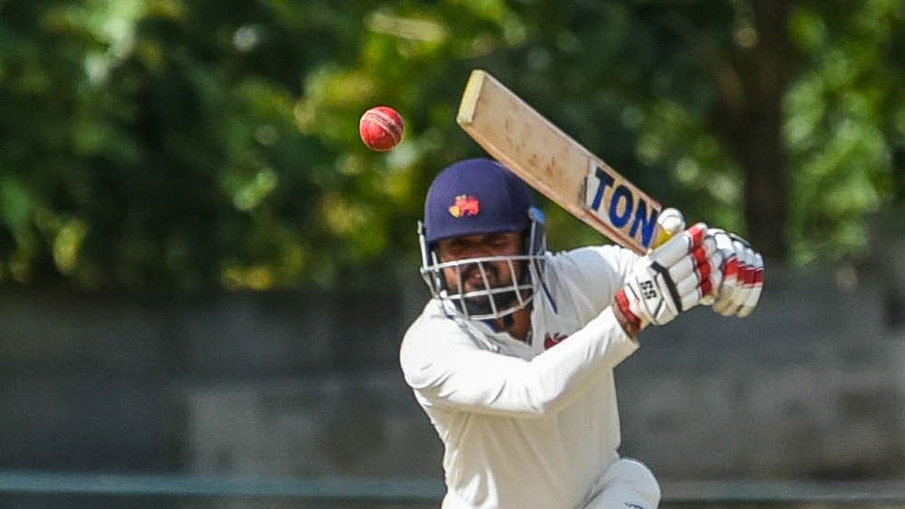 Mumbai's Hardik Tamore drives one en route his century against Uttar Pradesh in the Ranji Trophy semifinal at Just Cricket grounds on Wednesday. Credit: DH Photo/Pushkar V