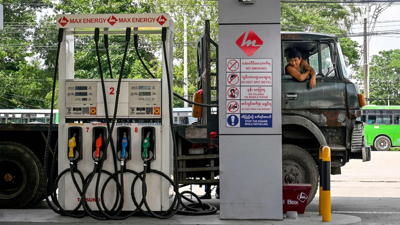 The new prices came into effect from Wednesday midnight and showed a massive hike of Rs 24 per litre in petrol prices and Rs 59.16 per litre of high-speed diesel. Credit: AFP Photo