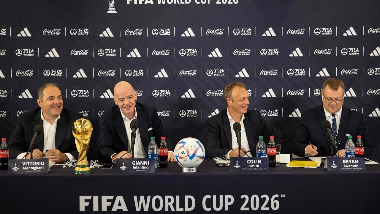 CONCACAF President Victor Montagliani, FIFA President Gianni Infantino, FIFA Chief Tournament & Events Officer Colin Smith and FIFA Director of Media Relations Bryan Swanson hold a press conference in New York. Credit: AFP Photo