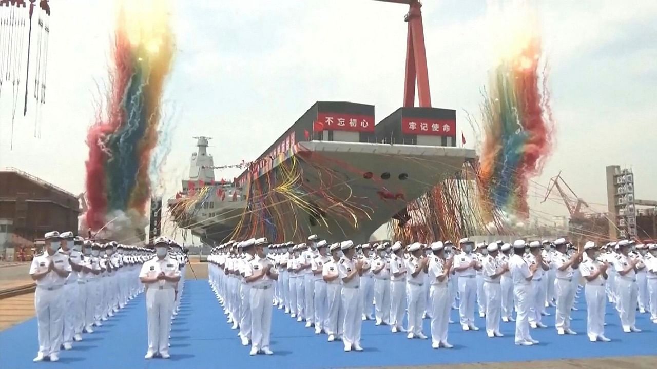 Launch ceremony of the Fujian, a People's Liberation Army (PLA) aircraft carrier, at a shipyard in Shanghai  Credit: AFP/CCTV