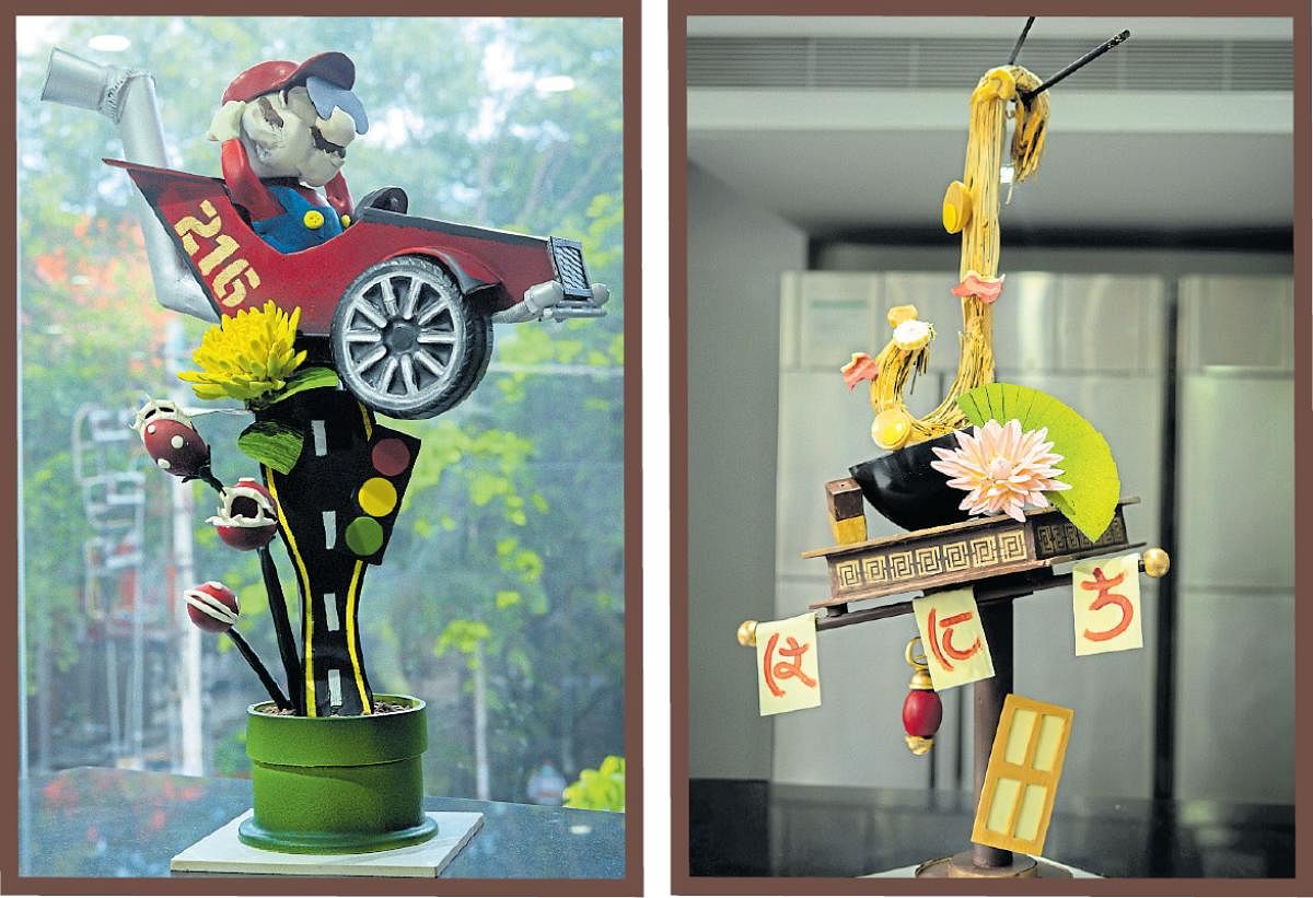 Chef Vinesh Johny and students from his academy used chocolate to create tributes to video game character Mario and to the Japanese noodles culture. Credit: DH Photo