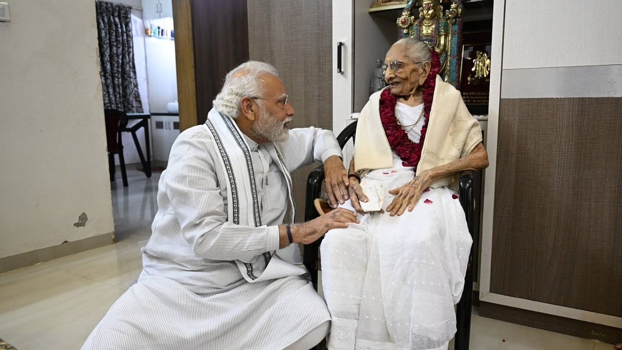 Narendra Modi with his mother. Credit: Twitter/@narendramodi
