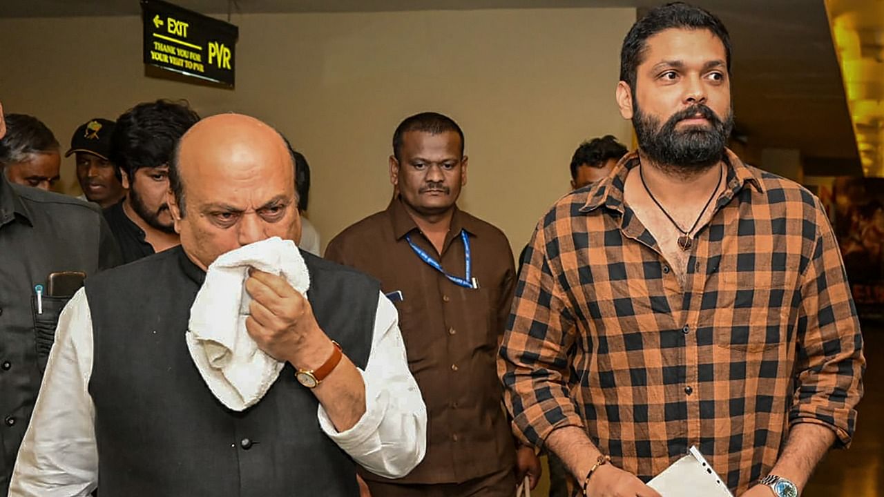 Karnataka Chief Minister Basavaraj Bommai with film actor Rakshit Shetty after watching the film '777 Charlie', in Bengaluru. Credit: PTI Photo