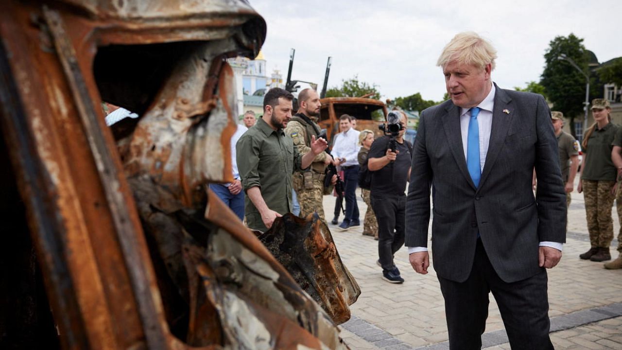 British Prime Minister Boris Johnson and Ukraine's President Volodymyr Zelenskyy visit an exhibition of destroyed Russian military vehicles and weaponry in Kyiv. Credit: Reuters Photo